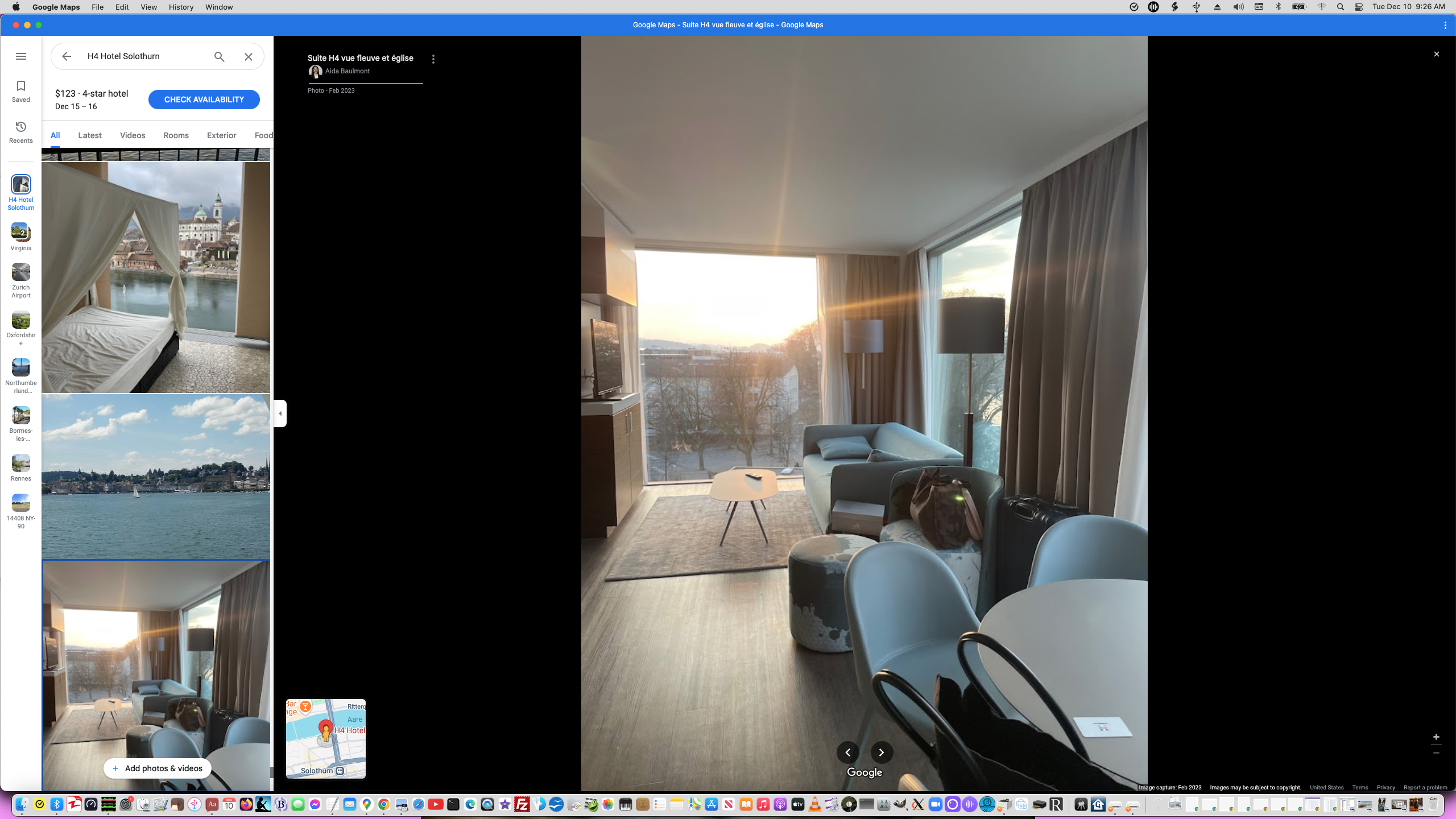 ./Screen Shot 2024-12-10 at 9.26.59 AM - H4 Solothurn Studio Interior - Living Room view towards Couch and TV with outside view and Round Table - Spartan Room.png